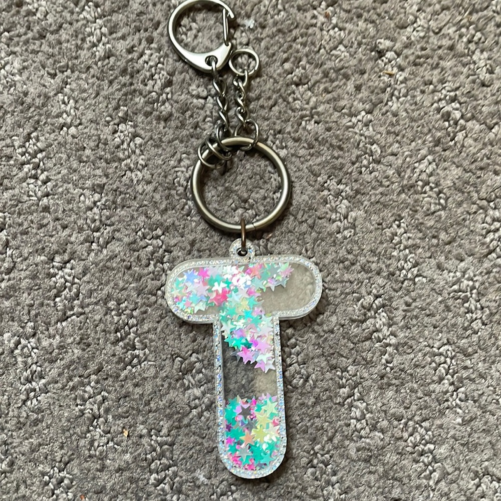 T key chain. Glitter moves. Great condition!